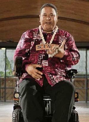 Pati Umaga wearing a necklace that reads SIVA